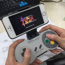 Classic SNES controller returns with an upgrade: The Bluetooth SNES30 & smartphone holder